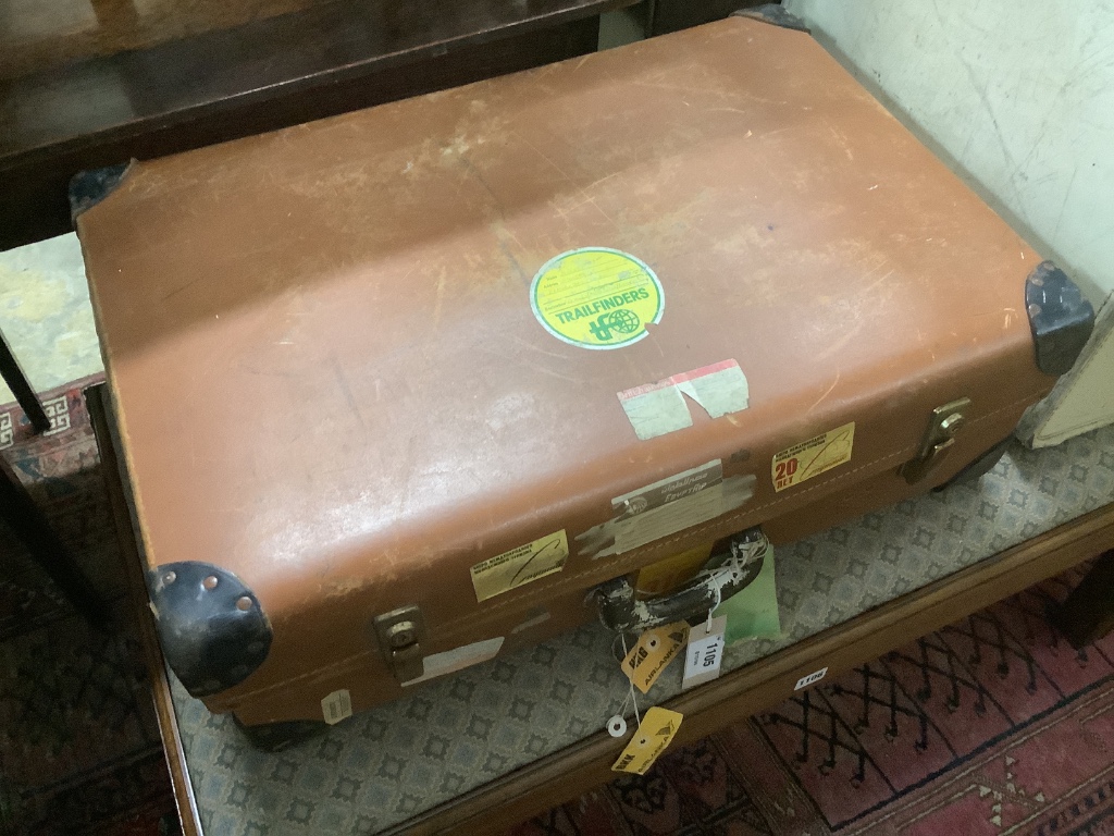 Four assorted vintage suitcases